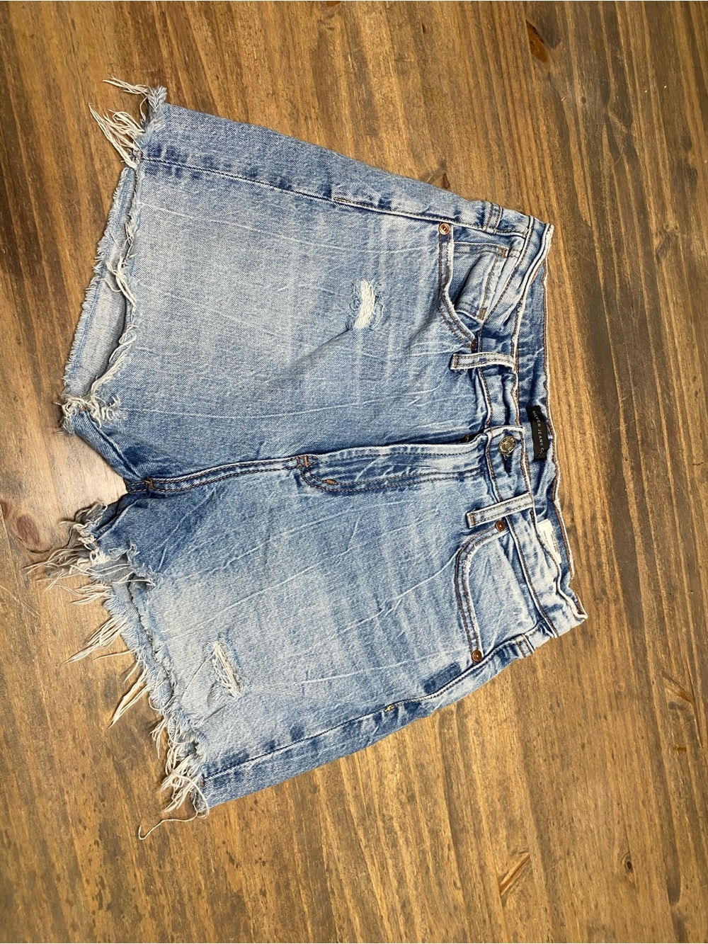 Silver Jeans Light Wash Frayed Hem Denim Shorts